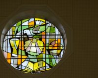 Stained glass window with dove